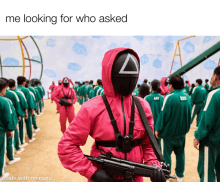 a man in a pink suit with a triangle mask holds a gun in front of a crowd