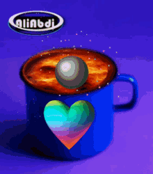 a blue cup with a heart in the middle and the word aliabdi on the top