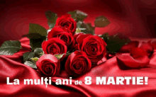 a bunch of red roses on a red cloth with la multi ani de 8 martie written in white