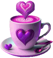 a cup of coffee with a purple heart in the middle