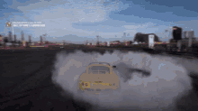 a yellow car is drifting on a race track with smoke coming out of it