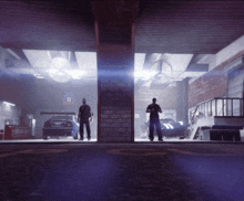 a man stands in a garage with a sign that says beer