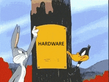 bugs bunny and daffy duck hang a sign that says hardware