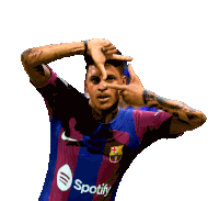 a soccer player wearing a spotify jersey making a face