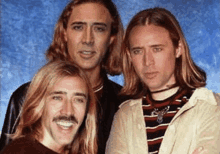 a group of men with long hair and mustaches are posing for a picture