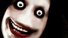 a close up of a scary woman 's face with big black eyes and red teeth .