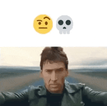 a man in a leather jacket is taking a selfie with a skull and smiley face .