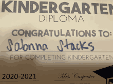 a kindergarten diploma that says congratulations to sabanna stacks for completing kindergarten