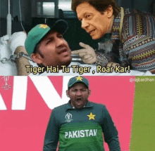 a man in a green pakistan jersey is screaming at another man