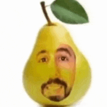 a pear with a man 's face and a leaf on top of it .