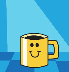 a yellow mug with a smiling face on it