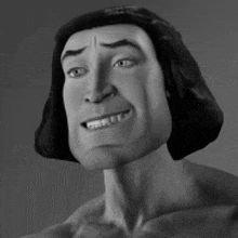 a black and white photo of a shrek character