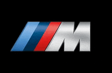 a bmw m logo on a black background .