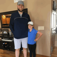 a man and a girl are posing for a picture