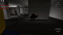 a screenshot of a video game shows a person crawling in a dark room