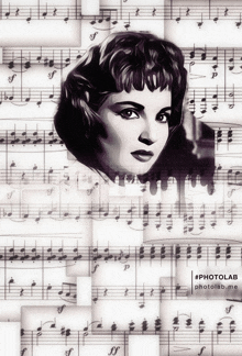 a black and white photo of a woman surrounded by sheet music with the hashtag #photolab