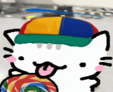 a drawing of a hello kitty wearing a colorful hat eating a lollipop