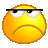 a yellow smiley face with a sad look on its face and glasses .