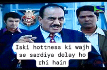 a man in a suit and tie says iski hottness ki wajah se sardiya delay ho rhi hain