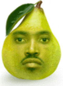 a pear with a man 's face and a leaf on top of it