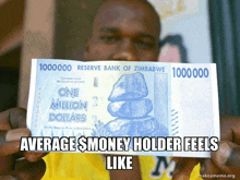 a man holding up a one million dollar bill