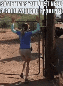 a woman standing in front of a fence with the words sometimes you just need a good workout partner above her