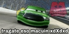 a green car is driving down a race track with the words tragate eso macuin xdxd