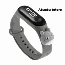 a digital watch with abuabu totoro written on it