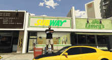 a man stands in front of a subway and limey 's restaurant