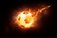 a soccer ball that is on fire with a black background