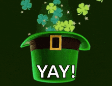 a green leprechaun hat with clovers coming out of it that says yay