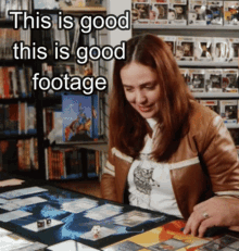 a woman sitting at a table with the words " this is good this is good footage " below her