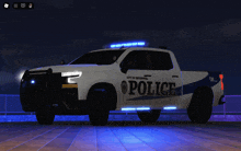 a city of enterprise police truck is parked on a pier at night