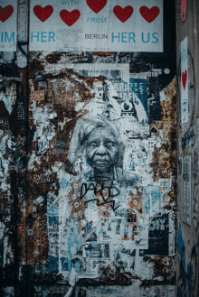 a poster on a wall that says ' with love from berlin her us ' on it