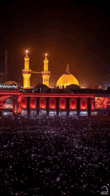 a crowd of people are gathered in front of a building with a dome that says ' islamic ' on it