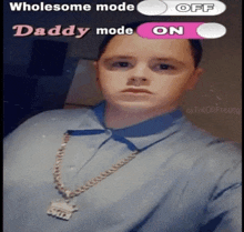 a man wearing a necklace that says daddy mode on