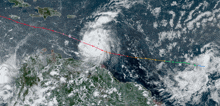 a satellite image of a hurricane with a red line going through it