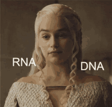 a close up of a woman 's face with the words rna dna above her