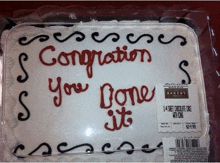 a congratulations cake with a price tag of $ 1.98