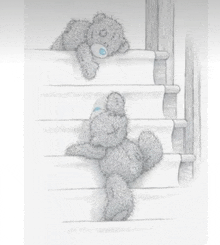 a couple of teddy bears are sitting on top of a set of stairs .