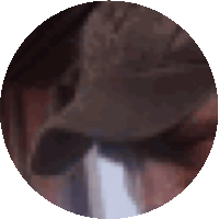 a close up of a person 's face with a hat on