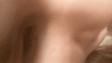 a close up of a person 's torso with a blurry background .