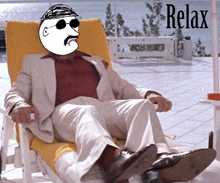 a man in a suit sits in a chair with the word relax written above him