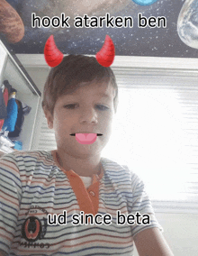 a boy with devil horns on his head has hook atarken ben ud since beta written on the bottom