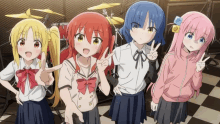 a group of anime girls standing next to each other and giving peace signs