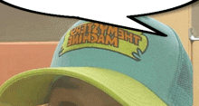 a person wearing a hat that says safety smithdam on it