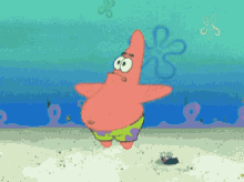 patrick star from spongebob squarepants is standing on a sandy beach