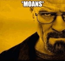 a man with glasses and a beard has the word moans on his forehead