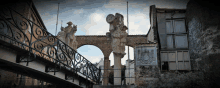 a bridge with a statue of a man carrying a bag