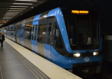 a blue train with the number 2151 on the front of it